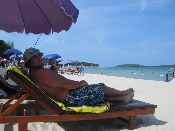 Rob chilling on the beach outside our motel